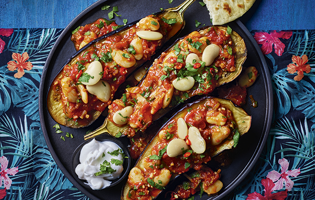 Baked aubergines with beans on top